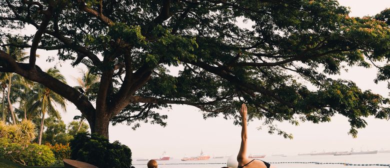 Yoga by Sentosa's Beach